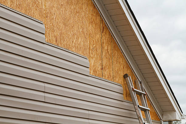Professional Storm Damage Siding Repair technician working in Avenel, NJ